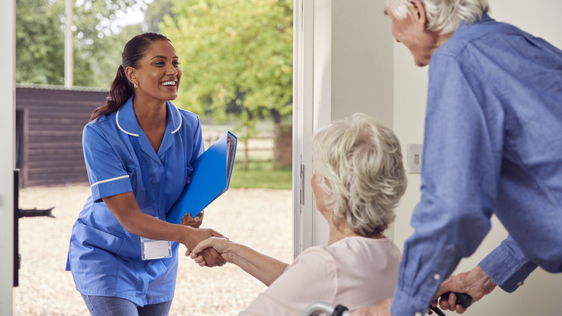 Home nurse meeting clients